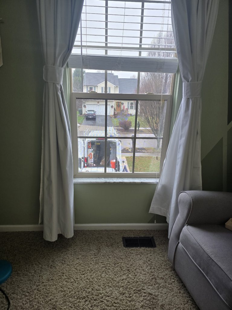 Repaired residential window glass
