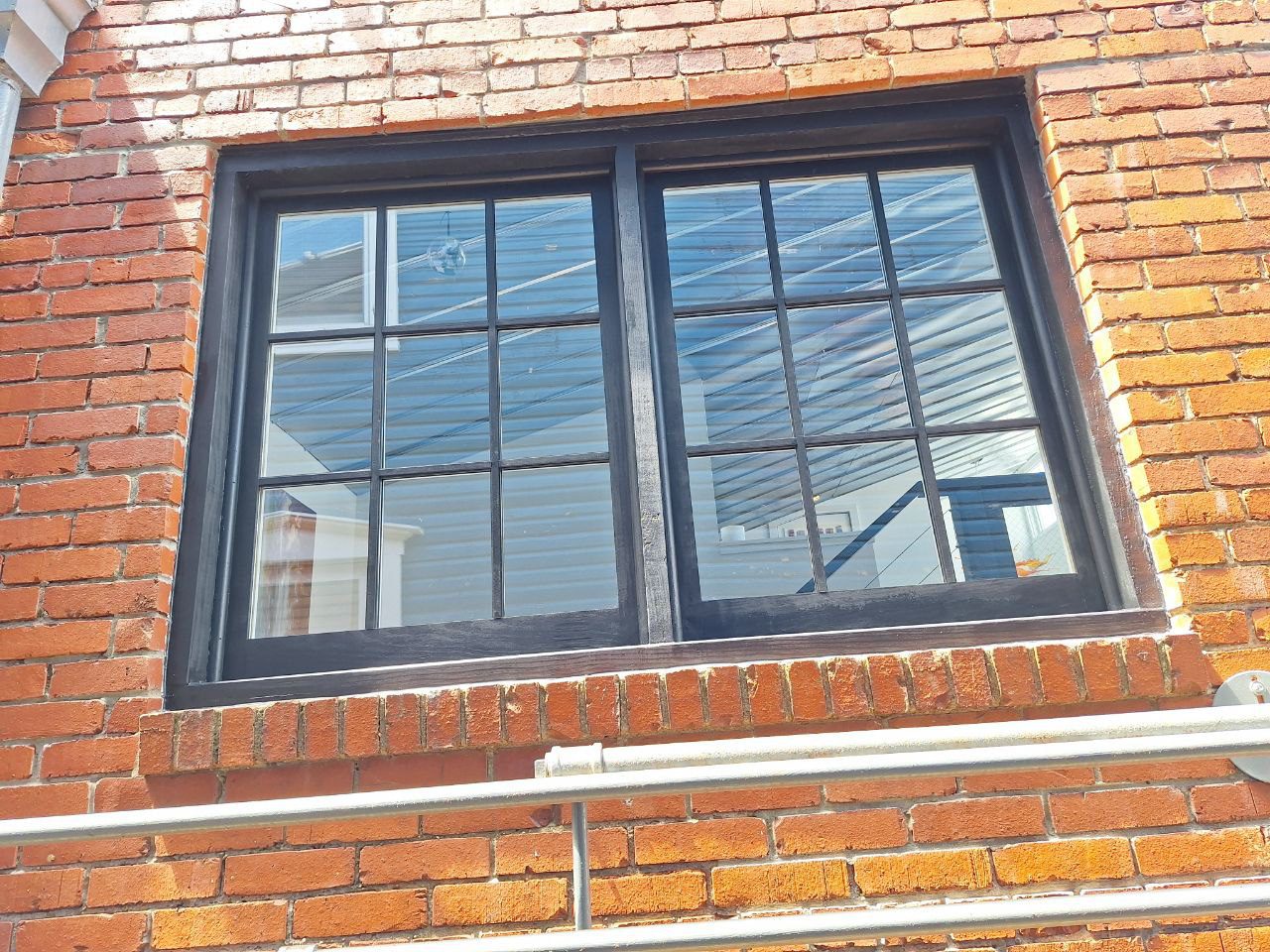 Revamping Historical Charm: The Grandview Heights Brick Building Window Project